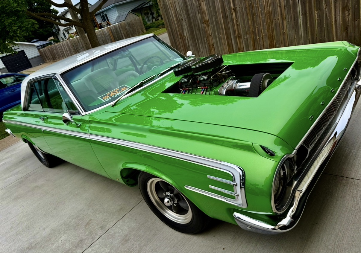 Classic green muscle car detailed by Lavigne Autospa