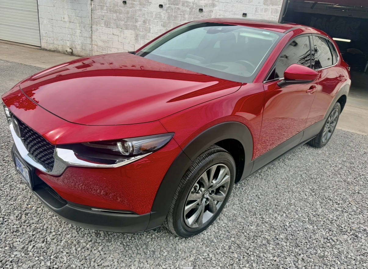 Red Mazda SUV detailed at Lavigne Autospa